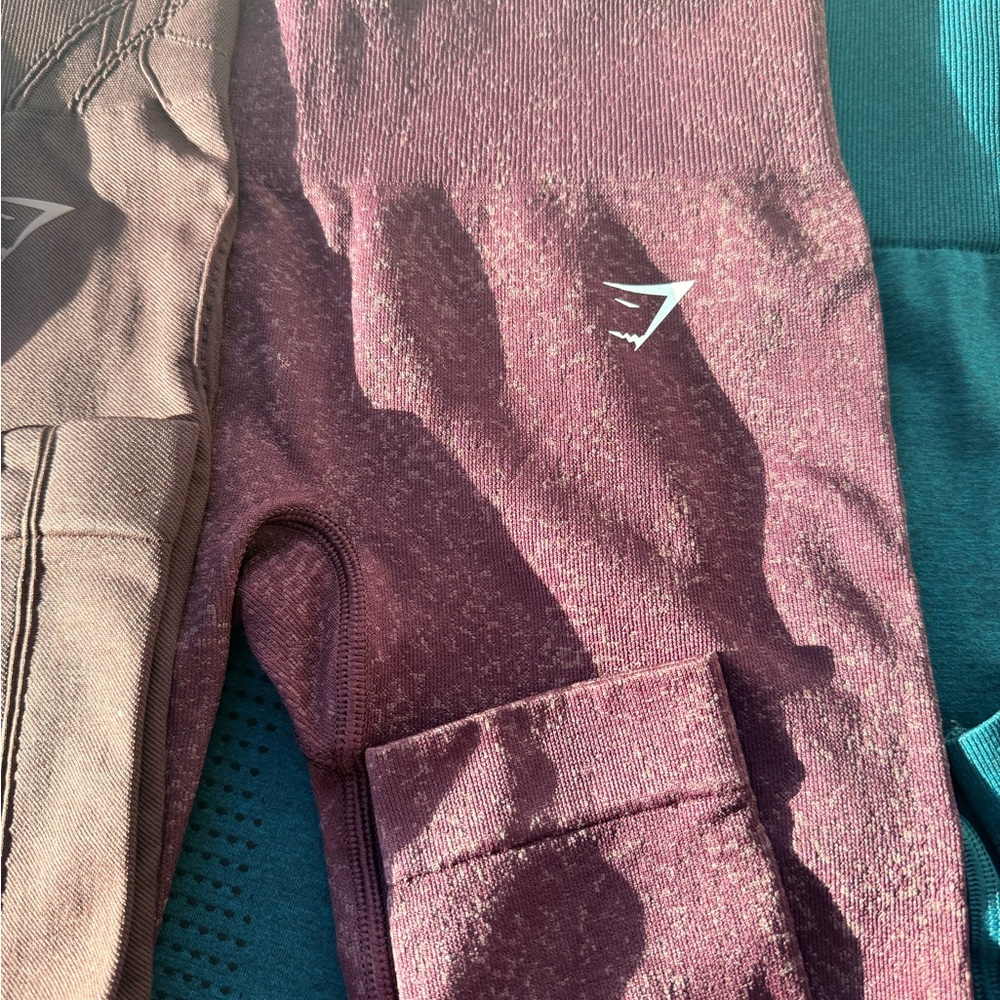 Gymshark 20 each. Colors brown, gray, yellow and Purple Active Leggings